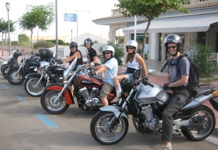 Motorbike hire Mallorca | Group of customers in front of the shop